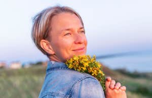 woman holding flowers