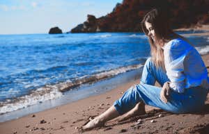 girl on beach wondering if i hadn't lost you