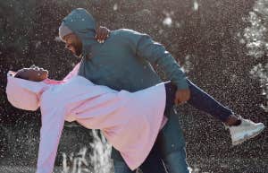 man and woman in snow