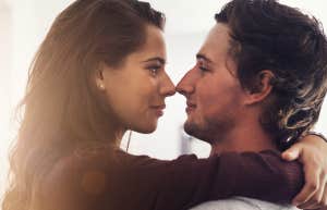 couple looking into each others eyes while hugging