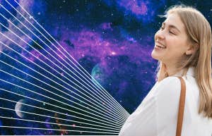 smiling woman and galaxy background