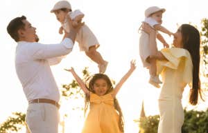 Mom and dad with three kids