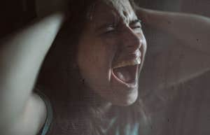 Why My Therapist Told Me To Be Angry At My Mother  Woman screaming holding her head, anger and sadness