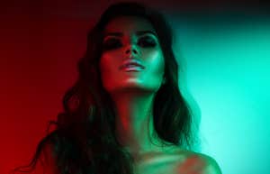 woman in dark neon room