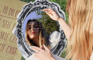 The One Thing You Need To Stop Doing If You Actually Want To Be Happy Woman looking sadly into a mirror