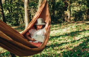 Woman napping in hammock