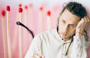 Man under a lot of stress, dealing with burnout 