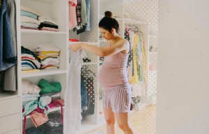 Woman organizing closet 