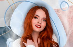 Smiling woman with red hair
