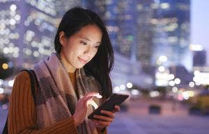 woman looking at phone 