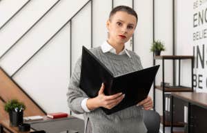 professional person sitting on desk