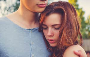 sad couple woman looking down