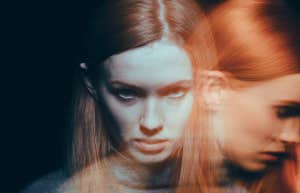 Beautiful, young woman feeling grief and sorrow
