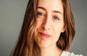 woman smiling looking forward