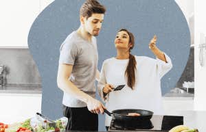 Woman cooking healthy dish for her partner 