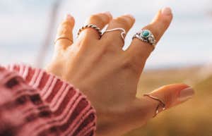 hand with rings on it