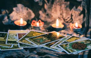 tarot cards with candles