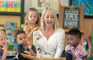 teacher reading to students