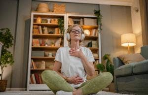 Woman meditating on the floor