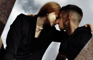 couple embracing hugging