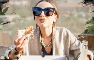 Woman happily nourishing her body with food