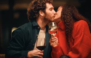 couple kissing on romantic date 
