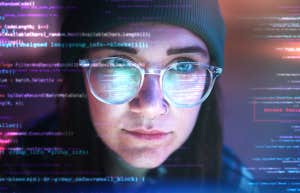 Double exposure, woman in dark room at night with a look of concentration on her face