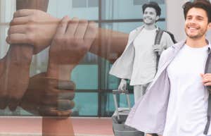 man happily traveling with luggage