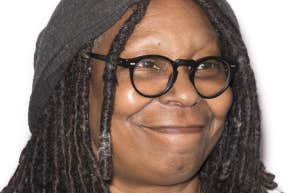 Whoopi Goldberg smirking
