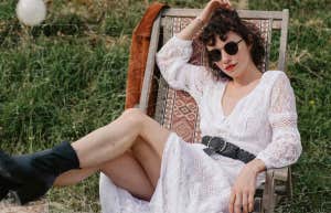 Woman sitting in lawn chair 
