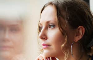 Woman looking out the window