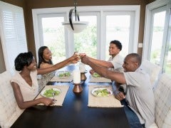 Two couples toasting