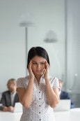 Confused woman looking uncertain, representing self-doubt and second-guessing as part of the struggle to feel enough